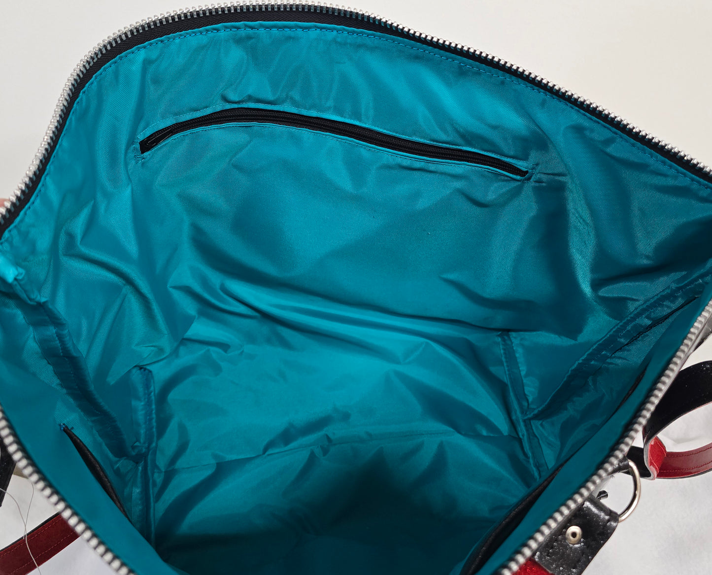 Extra deep 10" Zipper Pocket in Waterproof Lining