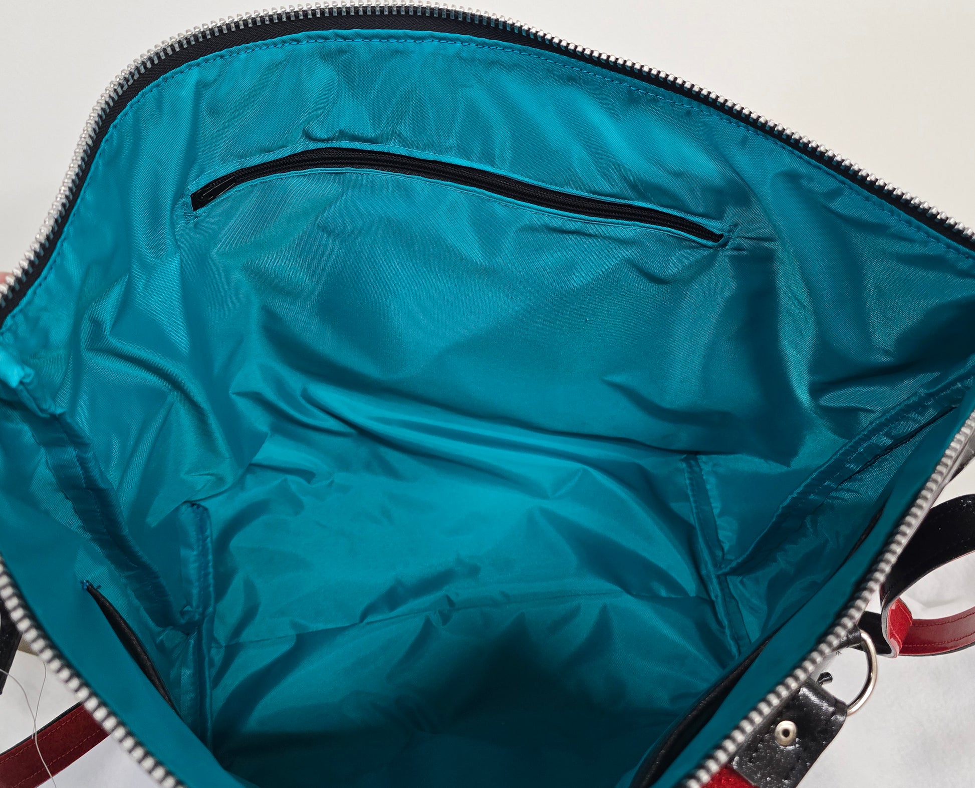 Extra deep 10" Zipper Pocket in Waterproof Lining